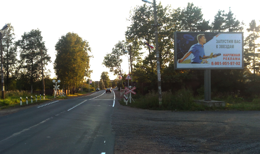 Щит на ш. Дорога Жизни, автобусная остановка Корнево, сторона А