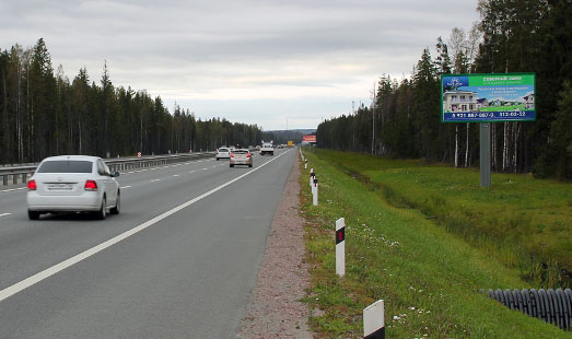 Щит на Новоприозерском шоссе, 22 км 450 м, cторона А - из СПб