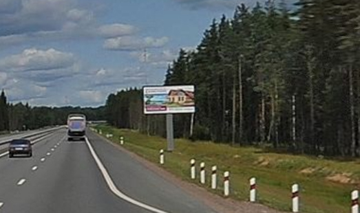 Щит на Новоприозерском шоссе, 26 км 500 м, cторона А - из СПб
