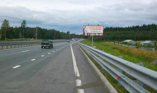 Щит на Новоприозерском шоссе, 4 км 400 м; за АЗС Shell, cторона А - из СПб
