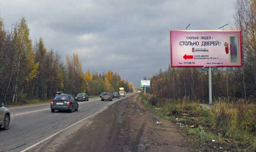 Щит на Токсовском шоссе, Новое Девяткино, остановка автобуса, cторона А - из СПб