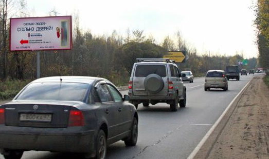 Билборд на Токсовском шоссе, Новое Девяткино, остановка автобуса, cторона Б - в СПб