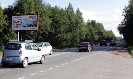 Билборд на Токсовском шоссе, 7 км 400 м, cторона Б - в СПб