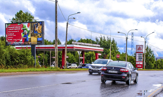 реклама на щите на Мурманском шоссе, АЗС ПТК, перед поворотом на пр. Державина, cторона Б