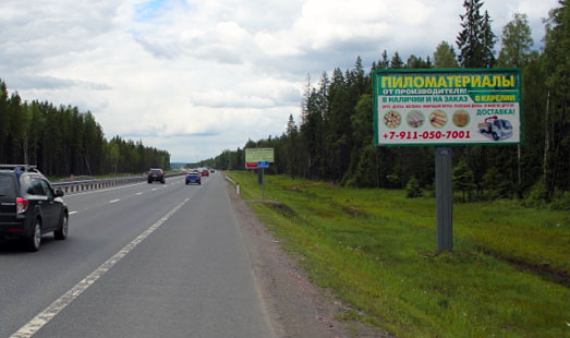 Щит на Новоприозерском шоссе, 20 км 980 м, cторона А - из СПб