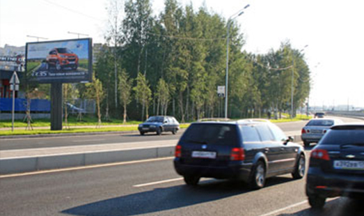 Билборд на Приморском шоссе, автосалон Омега Премиум Jaguar (АЗС Neste), cторона Б