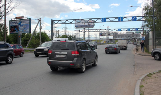 Билборд на Токсовском шоссе, 0 км 200 м, cторона Б - в СПб