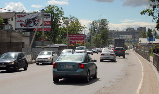 Билборд на Токсовском шоссе, 0 км 450 м, cторона Б - в СПб