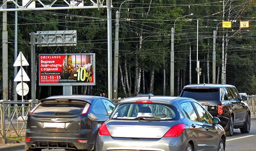 Реклама на щите в Санкт-Петербурге на Испытателей пр. 2 к.3, напротив / Богатырский пр.; cторона Б